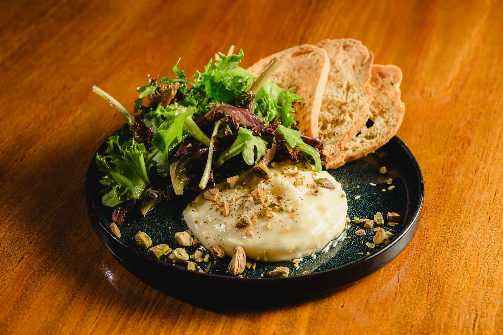 Gratinated Cheese with Pistachio and Honey